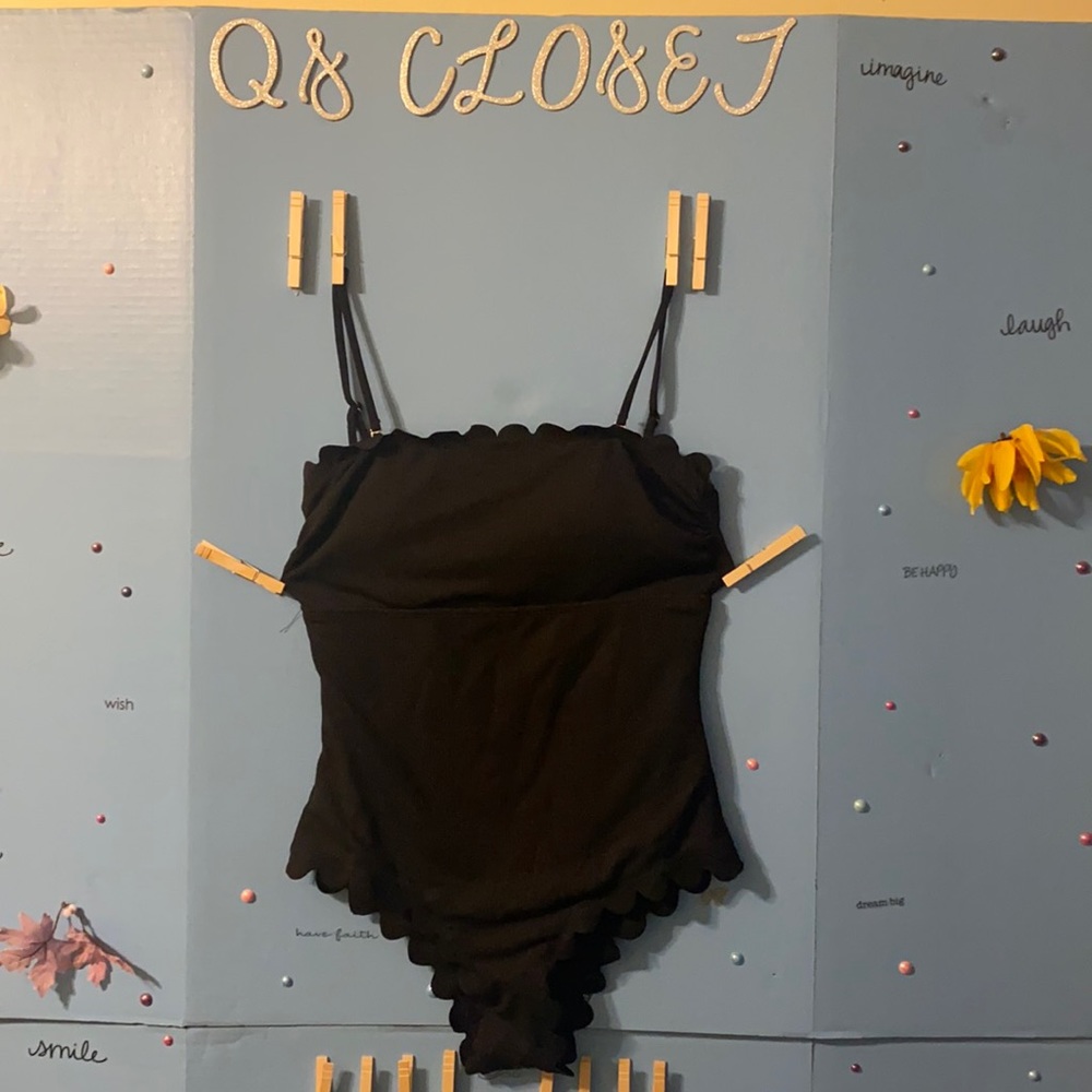 One piece black bathing suit